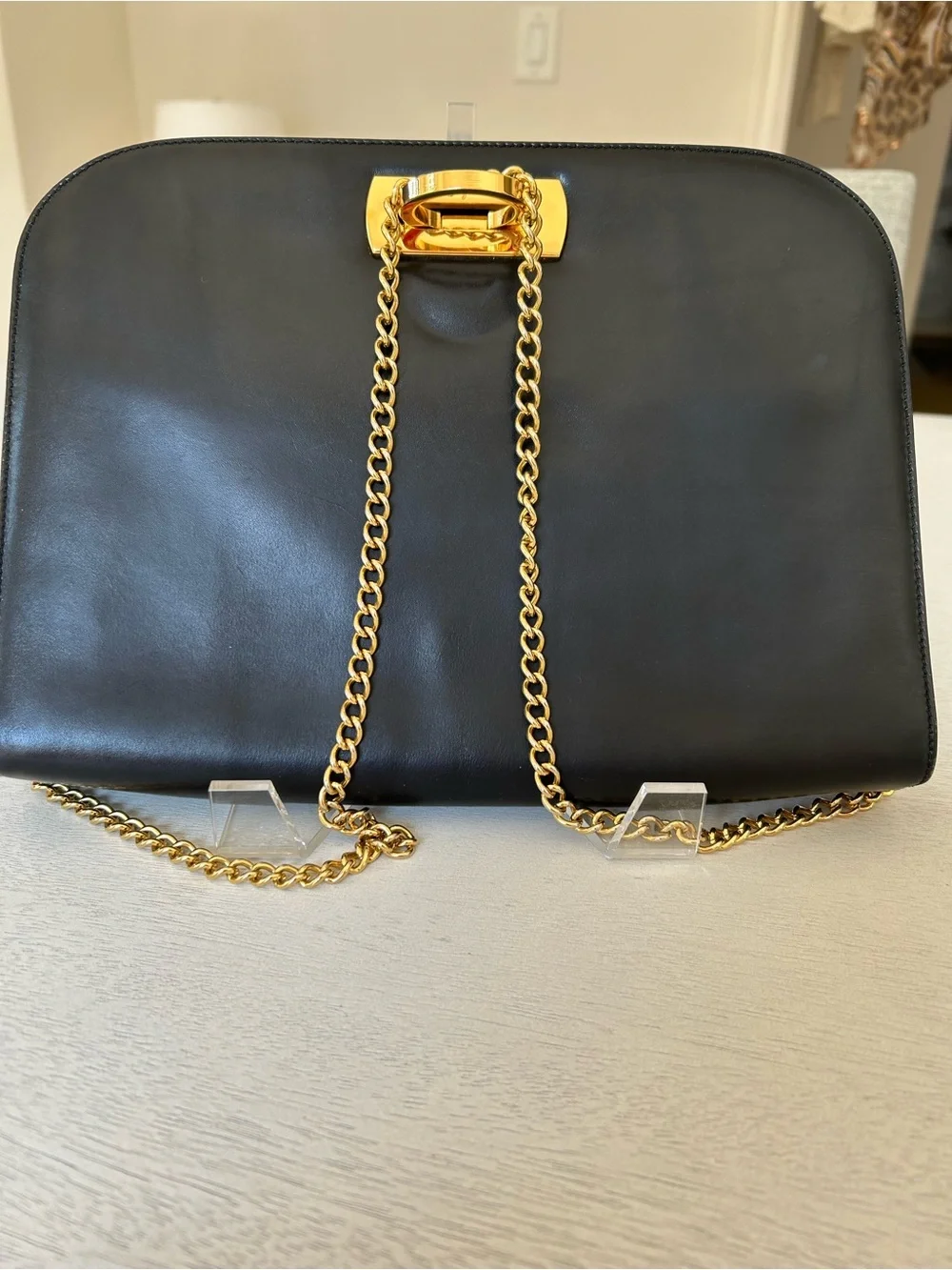 Salvatore Ferragamo Black Leather Clutch with Gold Ring Detail